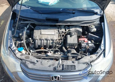 2011 Honda Insight Ex z USA, uszkodzony, nr VIN JHMZE2H74BS005777